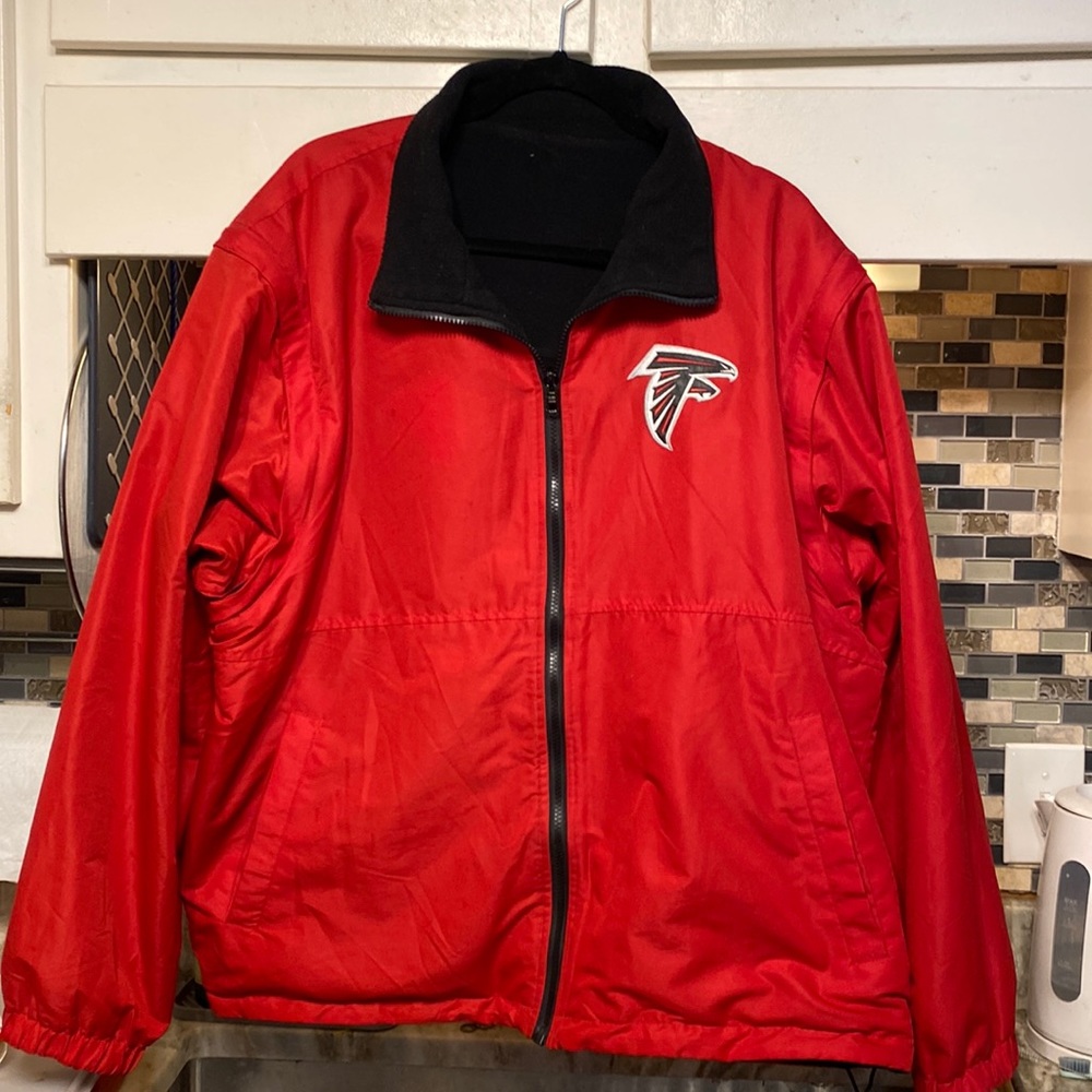 Atlanta Falcons reversible jacket with zip off sleeves to convert to a vest